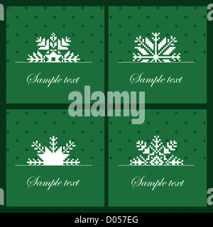 Quatre cartes avec des flocons de neige sur le fond vert Banque D'Images
