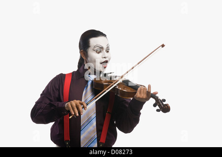 Un violon jouant Mime Banque D'Images