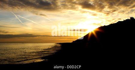 Le lever du soleil sur la plage de Cromer, Norfolk, East Anglia Banque D'Images