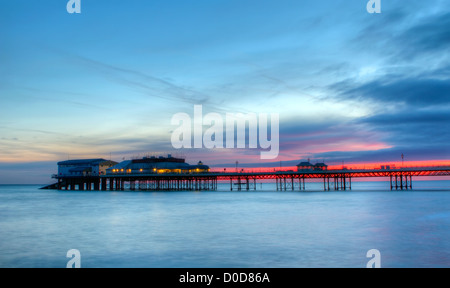 Lever du soleil à la jetée de Cromer, Norfolk, East Anglia Banque D'Images