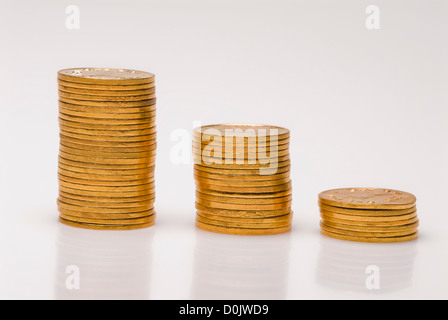 Des piles de pièces d'or Banque D'Images