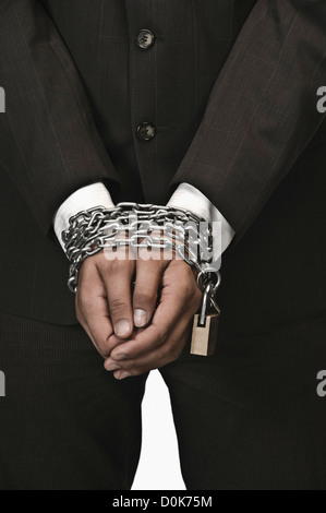 Close-up of a businessman's les mains avec des chaînes Banque D'Images