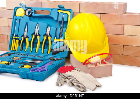 Concept de construction avec casque et toolkit Banque D'Images