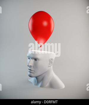 Tête avec un ballon rouge Banque D'Images