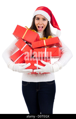 Jeune fille isolée Noël Holding Gift Banque D'Images