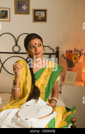 Bengali femme broderie et rêver Banque D'Images