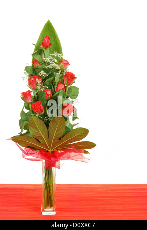 Bouquet de 11 roses rouges dans un vase Banque D'Images