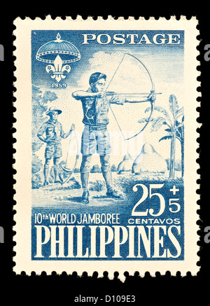 Timbre-poste des Philippines, illustrant une fusillade scout un arc et une flèche, émis pour le 10 ème Jamboree Scout Mondial. Banque D'Images