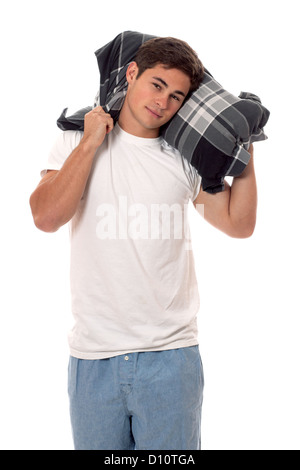 Jeune homme en pyjama. Studio shot sur blanc. Banque D'Images