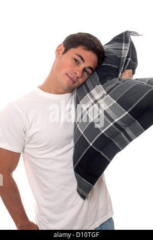 Jeune homme en pyjama. Studio shot sur blanc. Banque D'Images