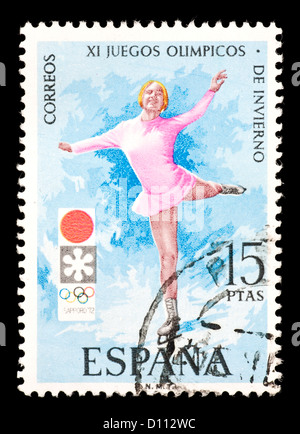 Timbre d'Espagne représentant une patineuse artistique, émis pour le 11 ème Jeux Olympiques d'hiver à Sapporo, Japon. Banque D'Images