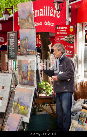 La peinture de l'artiste à la Place du Tertre à Montmartre, Paris France Banque D'Images