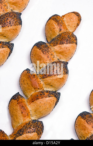 Bâtonnets de pain baguette aux graines de pavot à la forme d'une gerbe de blé s'appelle un Epi. Banque D'Images