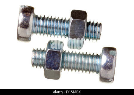 Close up of zinc vis couverts, isolé sur fond blanc Banque D'Images