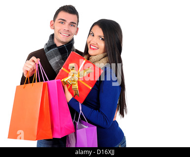 Les jeunes isolés casual couple shopping online Banque D'Images