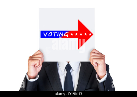 Businessman holding paper que dire la façon de voter Banque D'Images