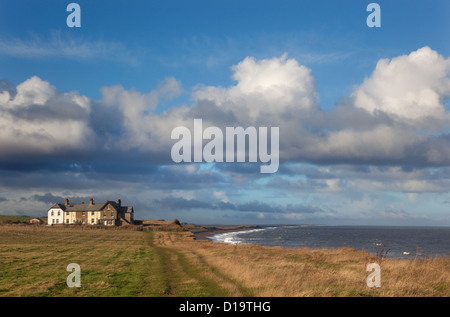 Coastal cottages & Norfolk Weybourne Chemin sur jour de tempête Banque D'Images