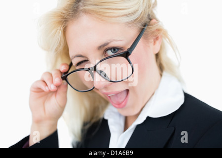 Close-up portrait of beautiful business woman winking Banque D'Images