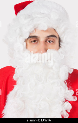 Portrait jeune homme en costume de Père Noël Banque D'Images