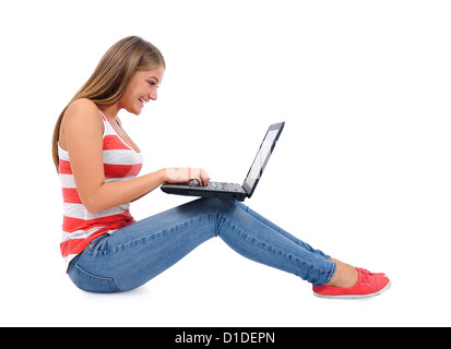 Young casual isolés woman using laptop Banque D'Images