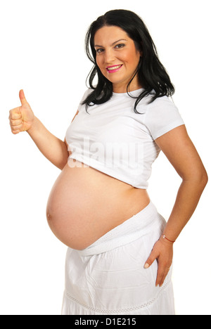 Femme enceinte avec succès dans l'article profil semi et giving thumb up isolé sur fond blanc Banque D'Images