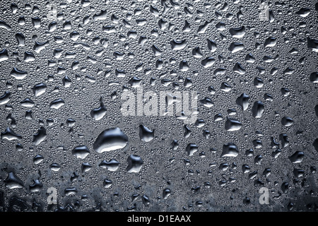 Résumé fond texture avec gouttes d'eau sur le verre Banque D'Images