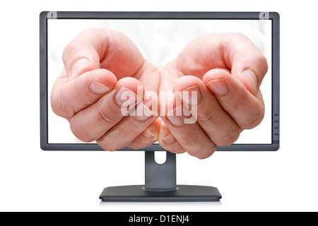 Paumes ouvertes qui sortent de l'écran de l'ordinateur Banque D'Images