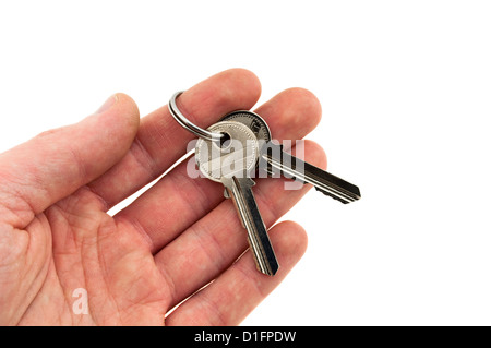 Deux clés en main isolé sur fond blanc Banque D'Images