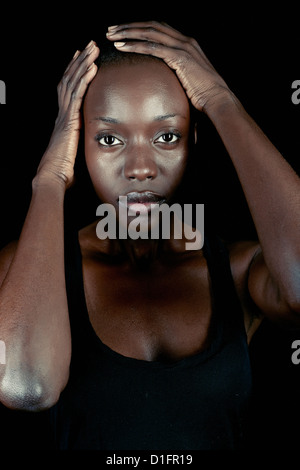 African American Woman with head in hands Banque D'Images