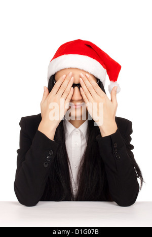 Young woman in santa hat Banque D'Images