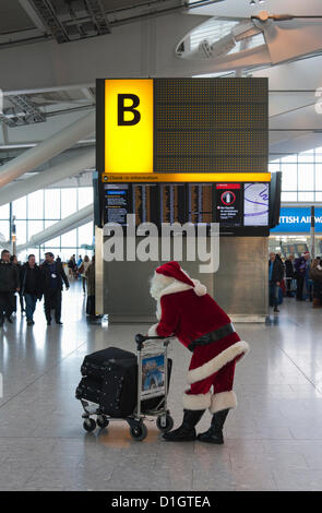 Le 21 décembre 2012. T5 L'aéroport de Heathrow, Londres, sur ce que l'on attendait d'être le jour le plus chargé pour Noël voyage. © Danny Callcut Banque D'Images