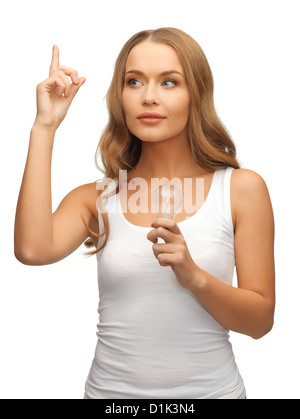 Femme avec ampoule à économie d'énergie Banque D'Images