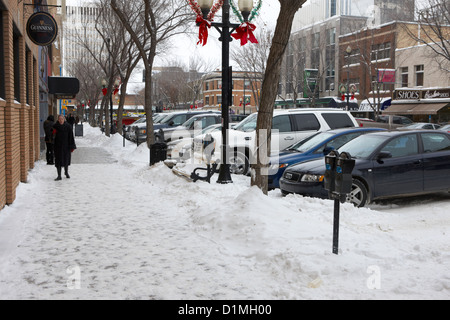 Les trottoirs couverts de neige au centre-ville de Saskatoon, Saskatchewan, Canada Banque D'Images