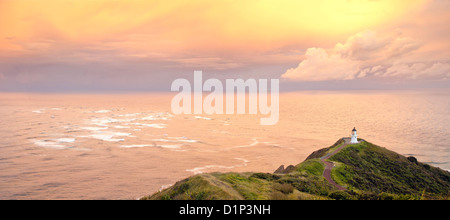 Au cours de la mer d'orange l'aube sur la Cape Reinga, Nouvelle-Zélande Banque D'Images