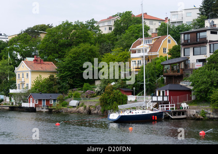 Maisons sur le bord du lac, Stockholm, Suède, Scandinavie, Europe Banque D'Images