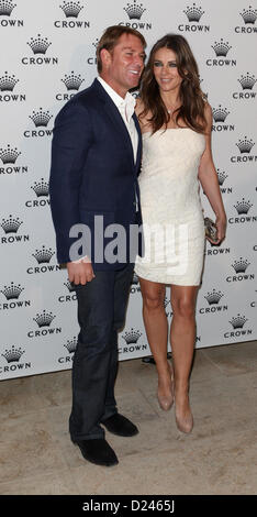 Shane Warne et Liz Hurley à l'IMG Les joueurs de tennis, couronne, Melbourne, le 13 janvier 2013. Banque D'Images