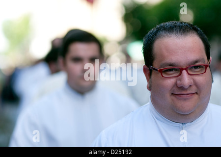 Séville, Espagne, un séminariste à la procession du Corpus Christi Banque D'Images