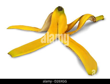 Pelure de banane sur un fond blanc avec une ombre comme un symbole de danger et risque de glisser sur le jaune des fruits tropicaux et une icône d'ordures jetées naturelles pour le compostage et le recyclage. Banque D'Images