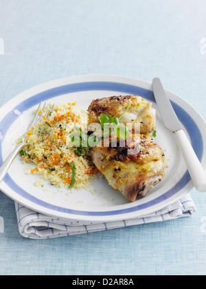 Assiette de poulet farci avec couscous Banque D'Images