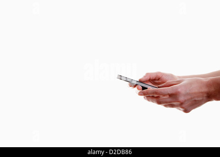 Femme à l'aide de Phone Banque D'Images