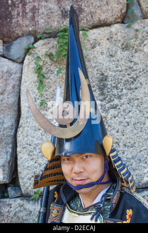 Le Japon, Honshu, Aichi, Nagoya, Nagoya Castle, Château Garde côtière dans l'Armure traditionnelle Banque D'Images