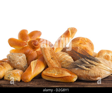 Divers types de pain sur la table en bois. Banque D'Images