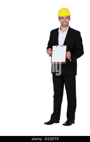 Homme avec casque jaune et portefeuilles Banque D'Images