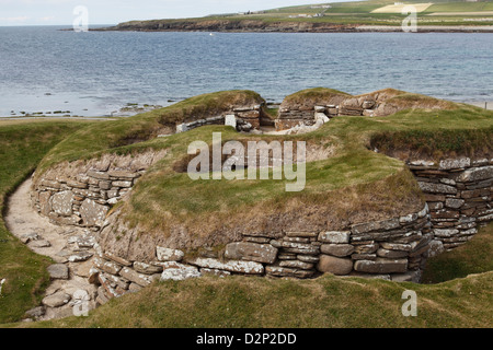 Une maison en pierre sèche à Skara Brae, un site néolithique en pierre, situé dans la baie de Skaill sur la côte ouest de la partie continentale. Banque D'Images