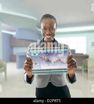 African American businesswoman using digital display Banque D'Images