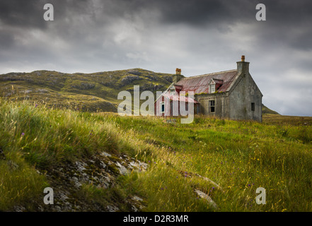 Maison à l'abandon sur Eriskay dans les Hébrides extérieures, sur un jour de tempête Banque D'Images