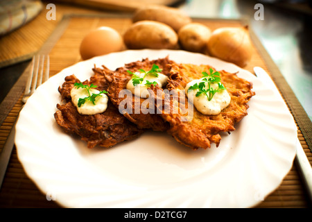 Galette de pommes de terre à la crème et persil Banque D'Images