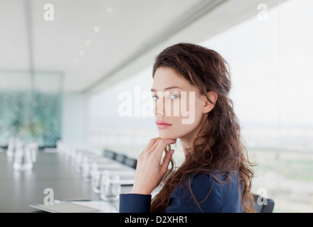 Portrait of serious businesswoman in conference room Banque D'Images