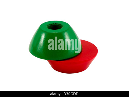 Couleur vert et rouge brique jouet en bois avec le trou dans le centre Banque D'Images
