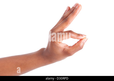 Gros plan du woman's hand gesturing - montrant ok sign, isolé sur fond blanc Banque D'Images